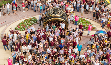 A crowd moving through the Haynes Aggie Ring on Aggie RIing Day