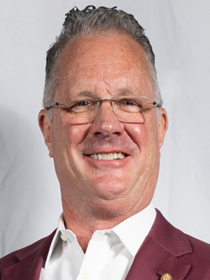 John B. Zachry '84